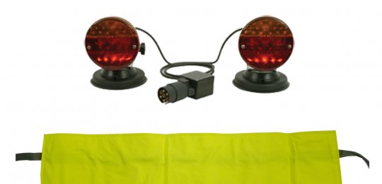 Two suction towing lights with radio control and flexible yellow plate