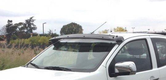 Supply and installation of a sun screen above the windshield