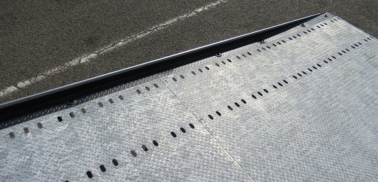 Replacement of grating floor with 3/5 galvanized tear sheets