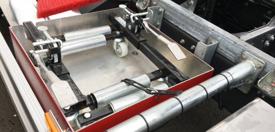 An open support on the equipment for two wheel dollies type "CHARIOTTE" (without dollies)