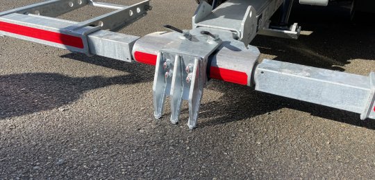 A  removable part adaptable to the Second Car Carrier with 2 pins and vertical spades for planting in the ground by lowering the Second Car Carrier