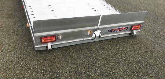 Two aluminum load ramps with hydraulic pivoting